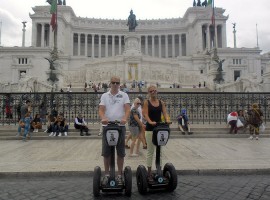 People parking their Segways in front of Piazza venezia in Rome