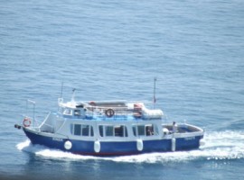 A Boat on the blue Amalfi sea