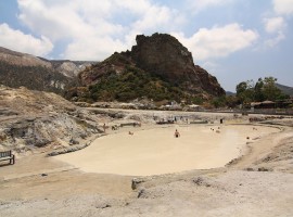 some people are sunk in the muds of the thermal pool (island of Vulcano, Eolie)