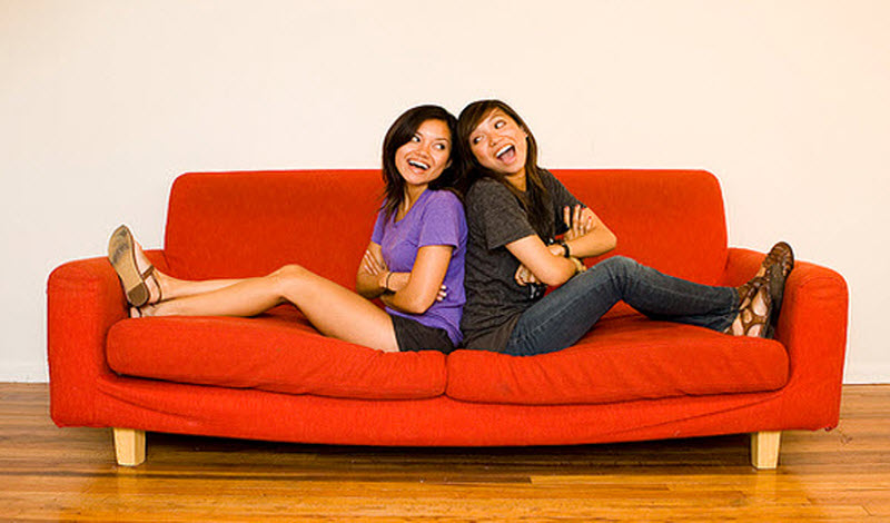 Two girls on a sofa