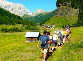Long walks in the Dolomitic landscape of Fassa Valley, starting from the Hotel Garden