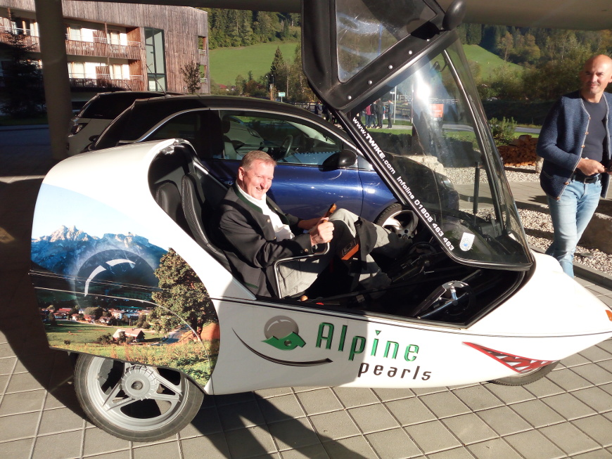 Peter Brandauer, mayor of Werfenwng, on board one of the many electric vehicles of the Alpine Pearl