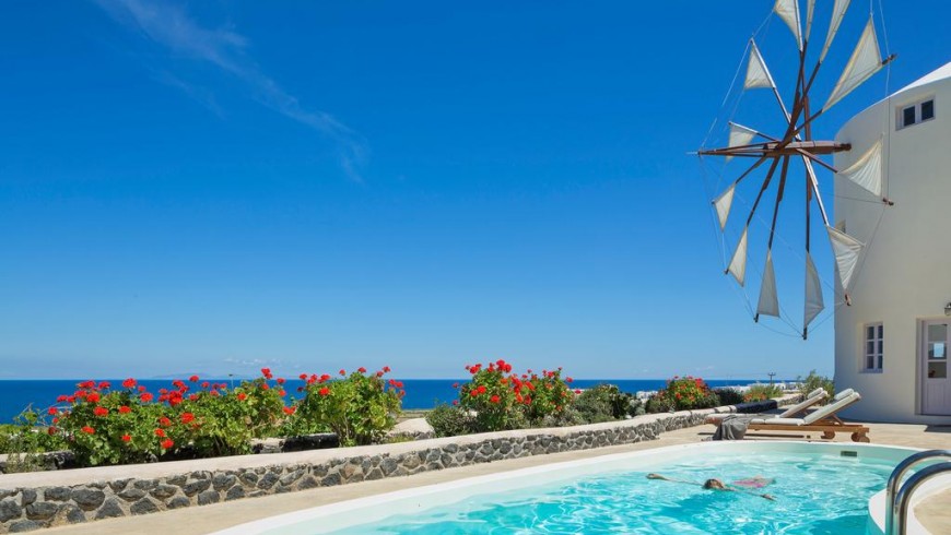 Windmill-shaped villas in Greece