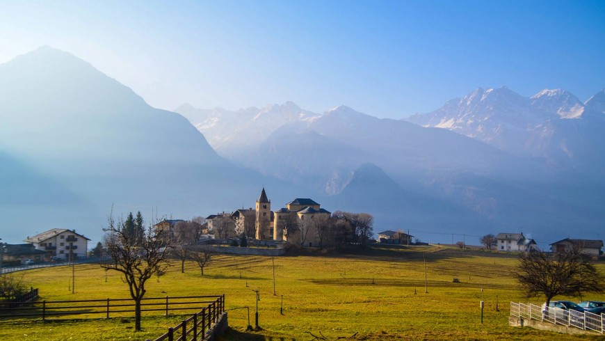 A castle in Varrayes in the Aosta Valley, surrounded by nature and the peaks of the highest mountains in Italy