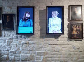 inside of the museum, here two portraits of two women