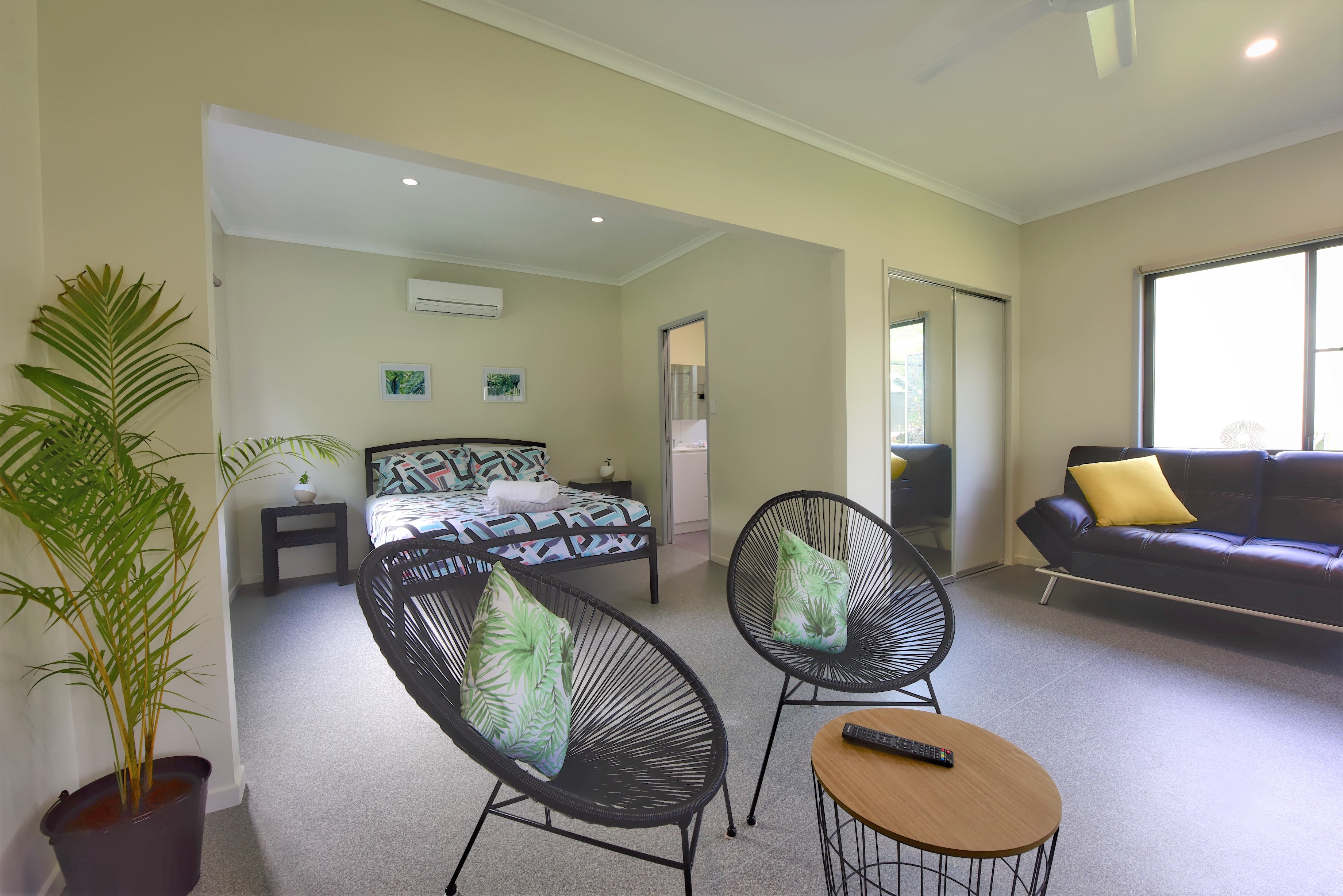 Accommodation with queens bed and extra sofa bed.