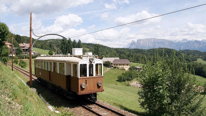 The Renon train, among the Dolomites