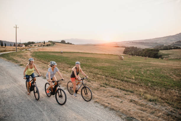 Women cycling in Massa Marittima and its National Park