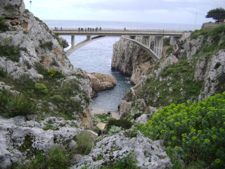 the famous bridge crossing the inlet of Ciole, photo via Wikipedia