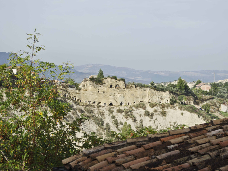 Prehistoric shelters in the mountains, Aliano, Basilicata, South Italy