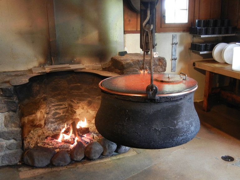 big pot on the fire to make cheese