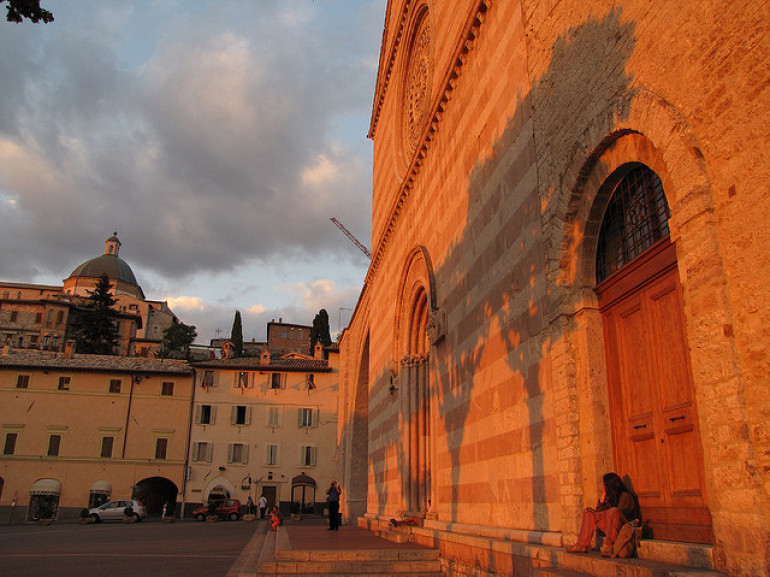 The shadow of the trees on the Church of Santa Chiara, Assisi. Photo by Christopher John SSF via Flickr