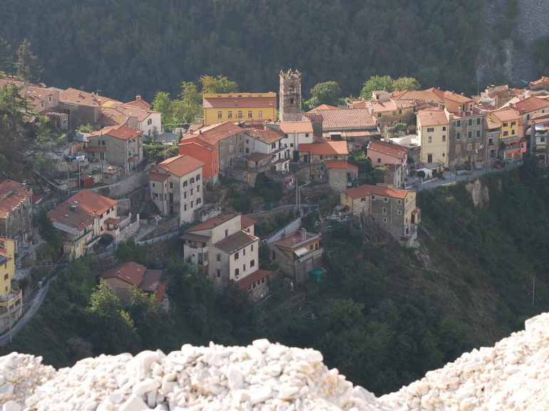 The small village of Colonnata, Massa Carrara, Tuscany, famous for its bacon, photographed from a marble quarry.