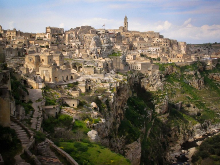 Ancient Matera...in the region of Basilicata. The homes of the Sassi dwellers were hand hewn caves carved into the soft limestone cliffs.