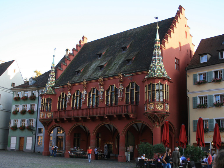 The Kaufhaus, the red building in the main square of Freiburg 